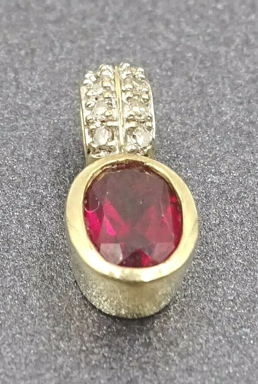 Garnet & Diamond 9ct Yellow Gold Pendant