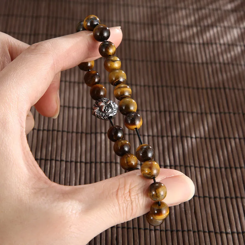 Handcrafted Turquoise and Volcanic Stone Beaded Bracelet with Tiger's Eye and Lion Head Accents for Men