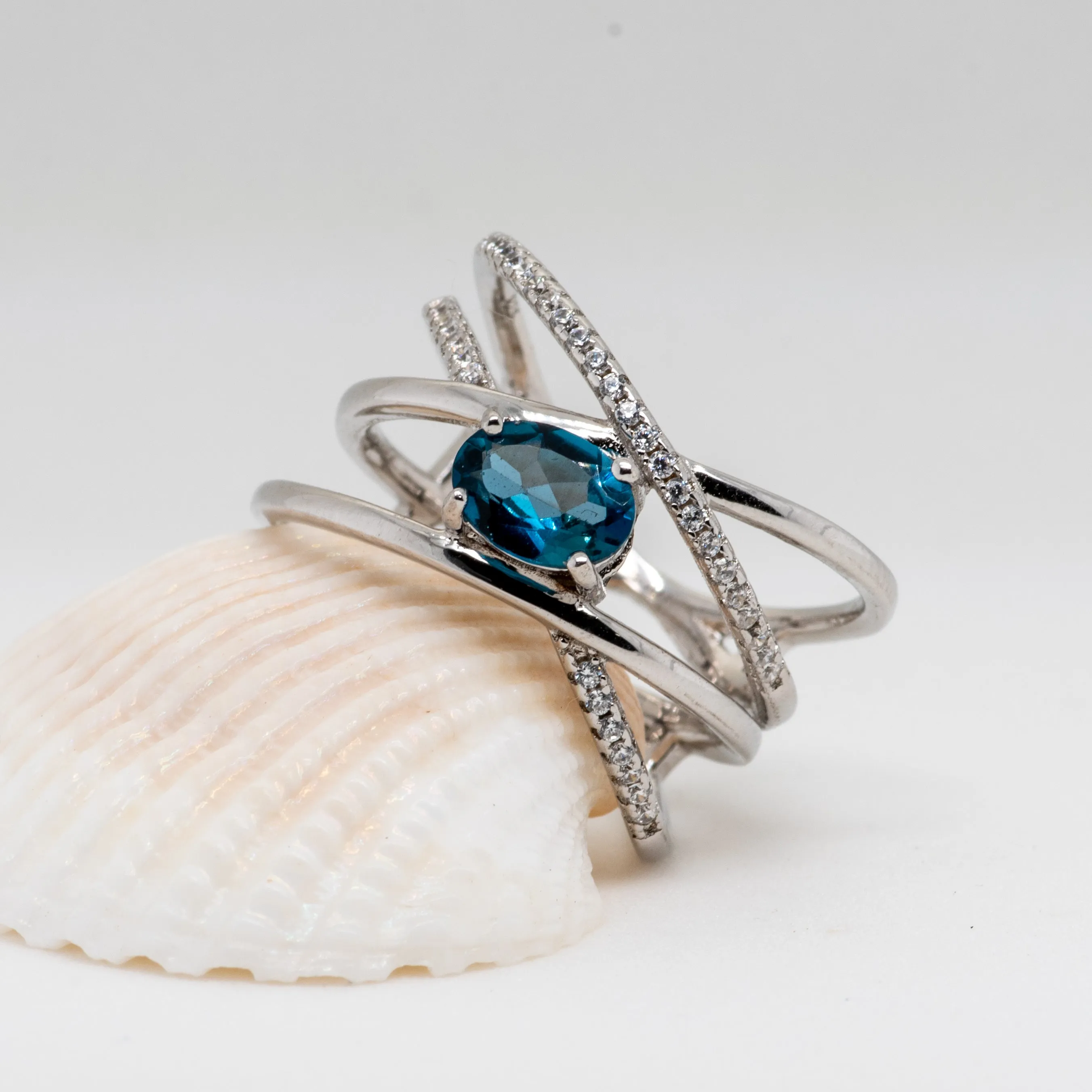 Lea Crossover London Blue Topaz Ring in Sterling Silver