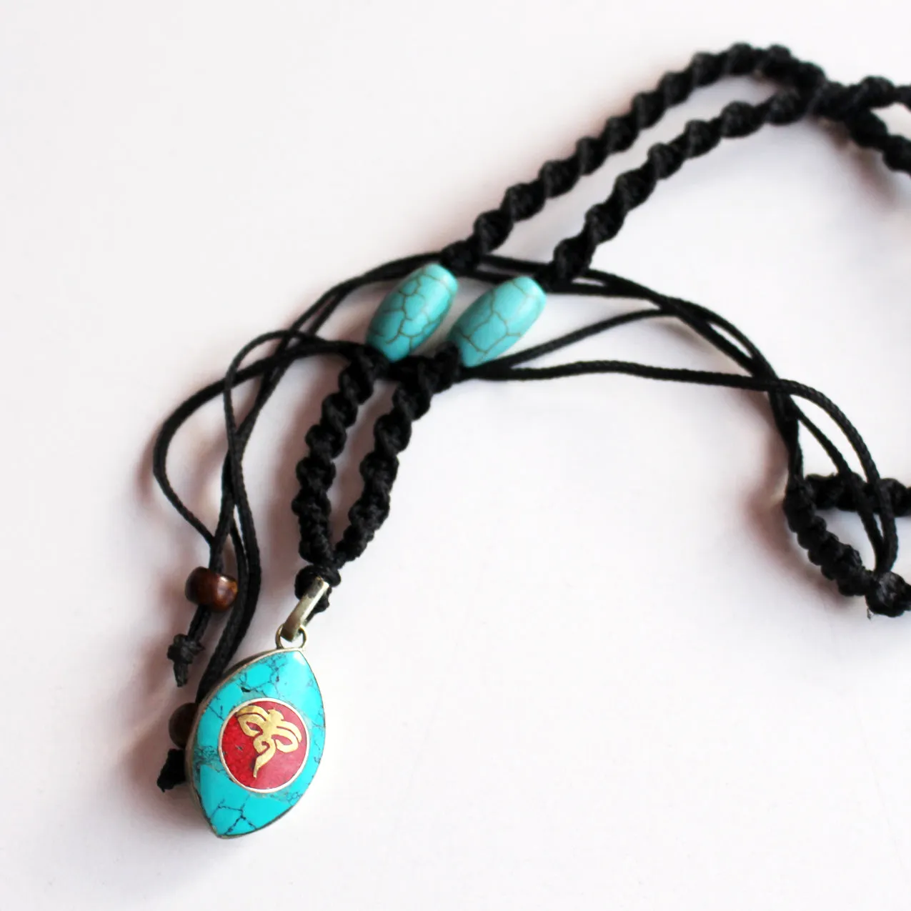 Turquoise and Coral Inlaid Buddha Eye Pendant Necklace